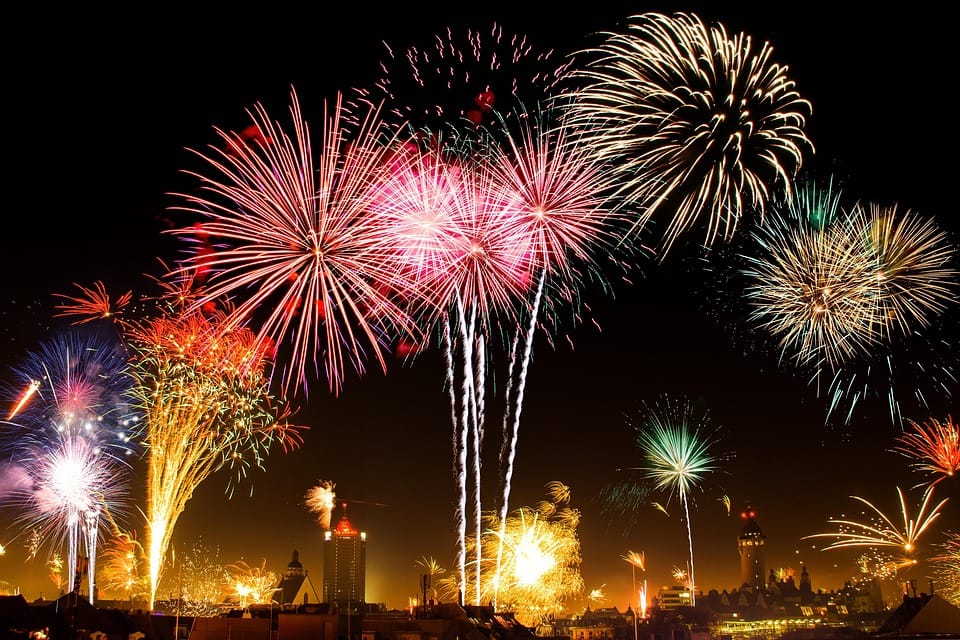 Spectacular fireworks above a city, on New Years Eve