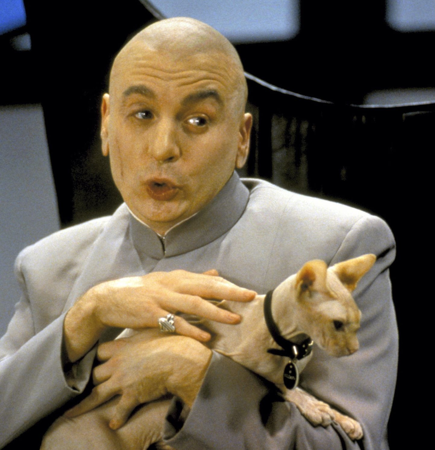 A picture of Dr Evil with his cat, Mr Bigglesworth